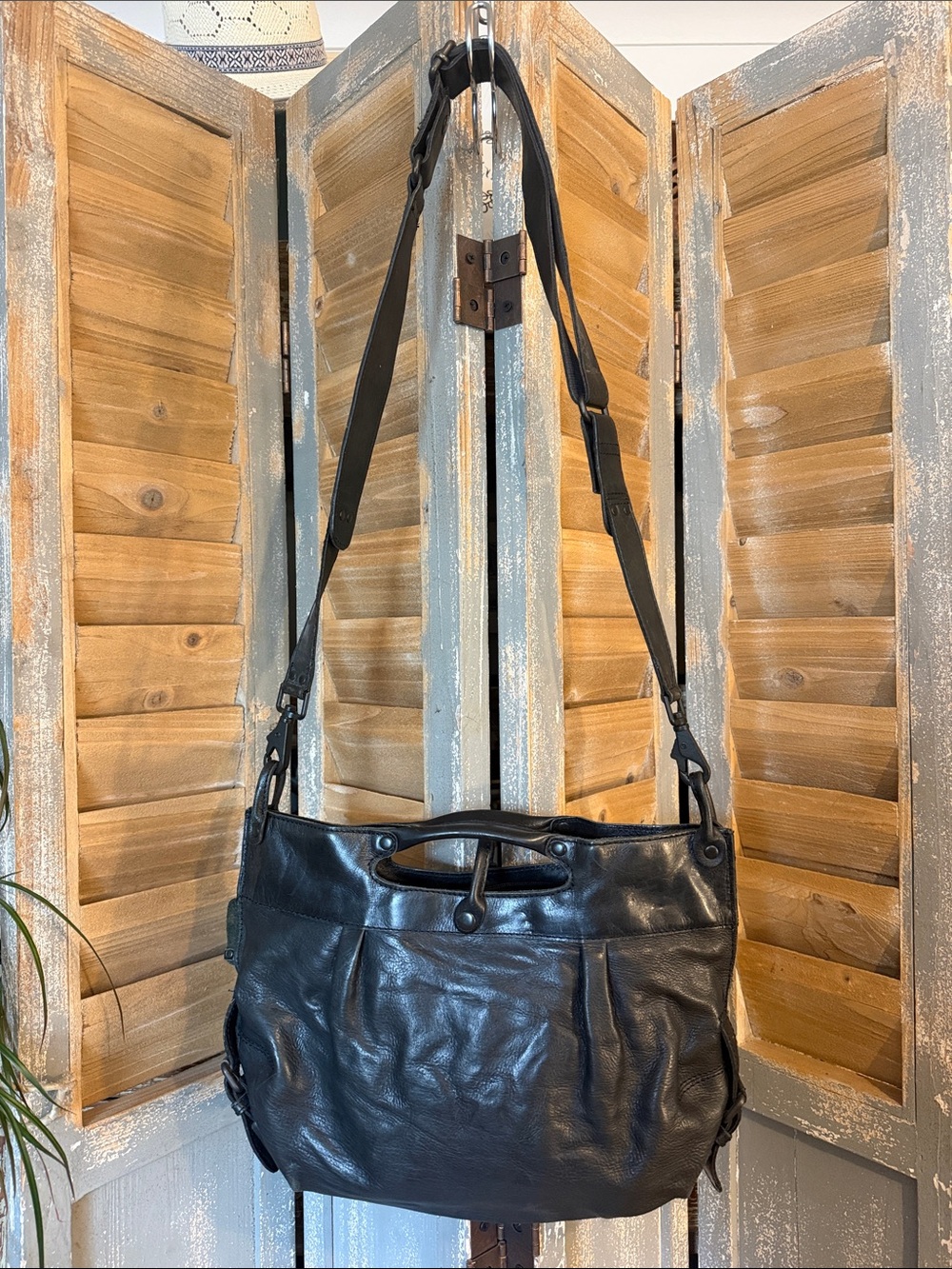 Aunts and Uncles Black leather crossbody bag